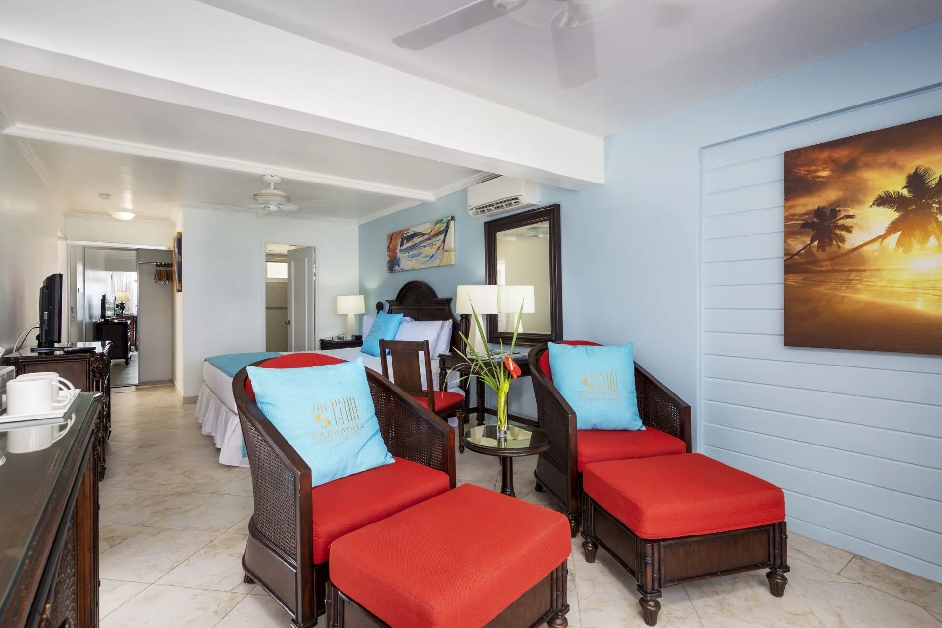 Superior Oceanfront room seating and bed at The Club, Barbados Resort & Spa.