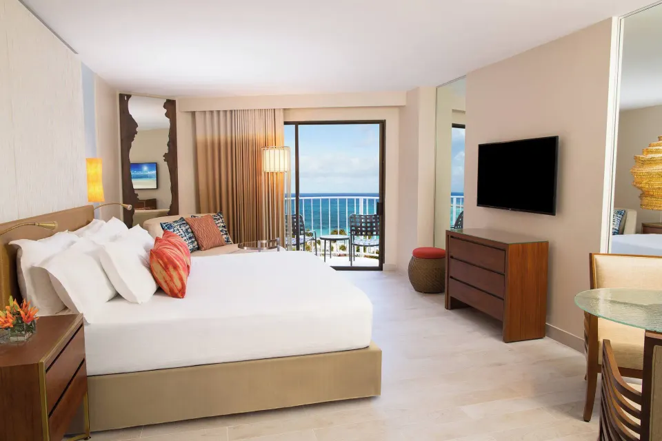 King guest room with balcony and ocean view at The Coral at Atlantis.
