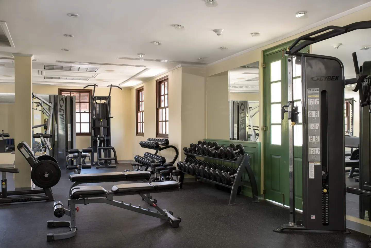 Fitness room with weights and exercise machines at The Crane Resort.