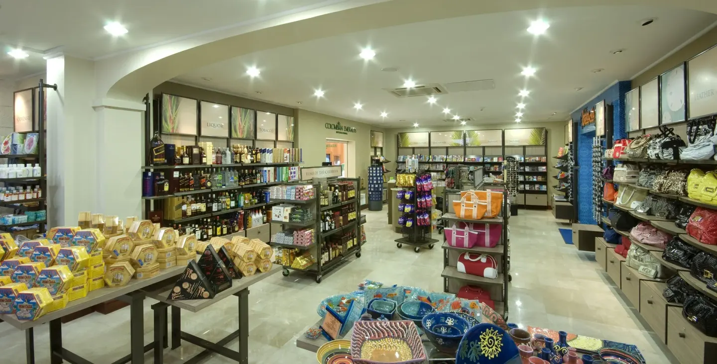Resort shop with gifts, snacks, bags, and shelves at The Crane Resort.