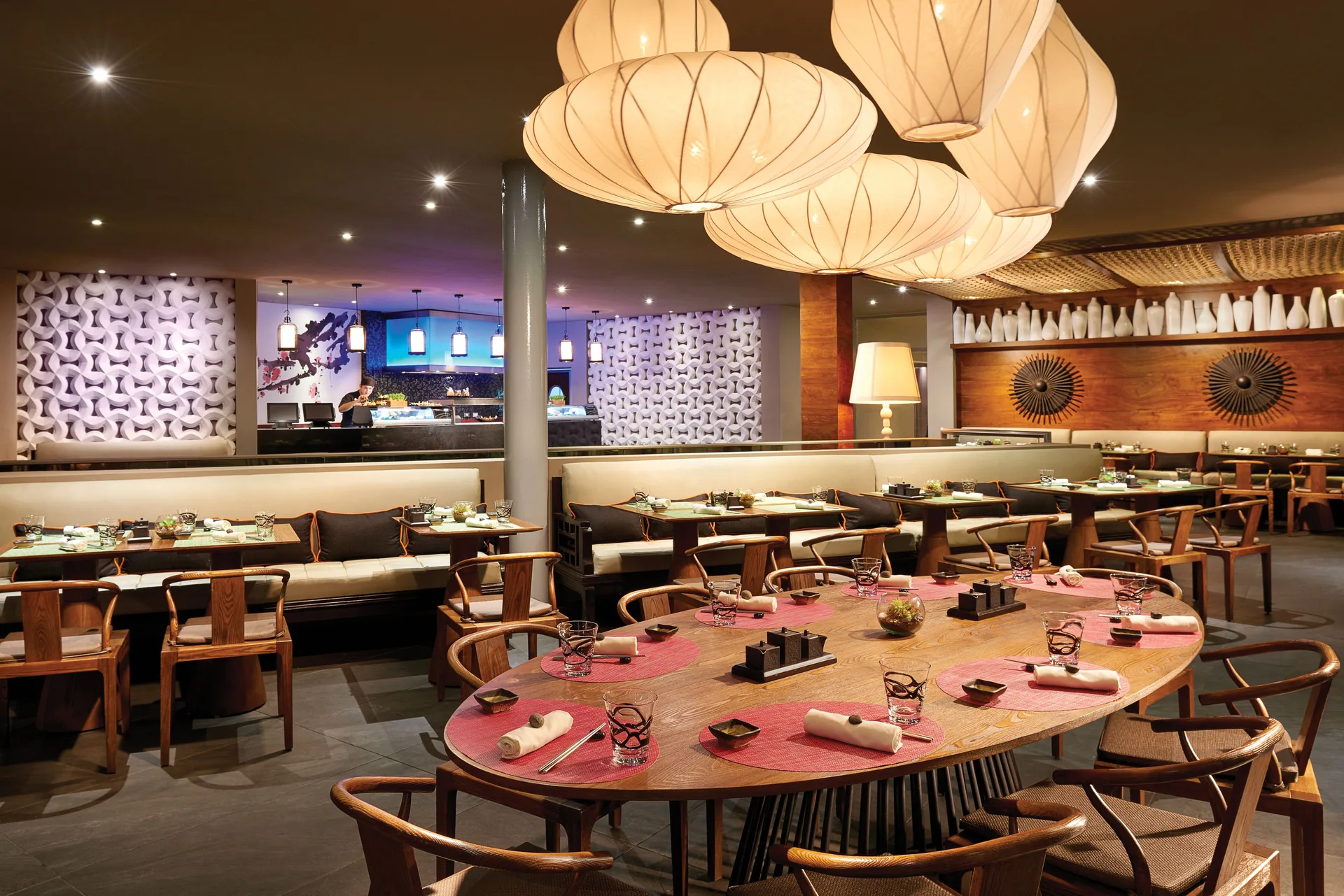 Japanese restaurant dining room with lantern lights at The Fives Beach Hotel.