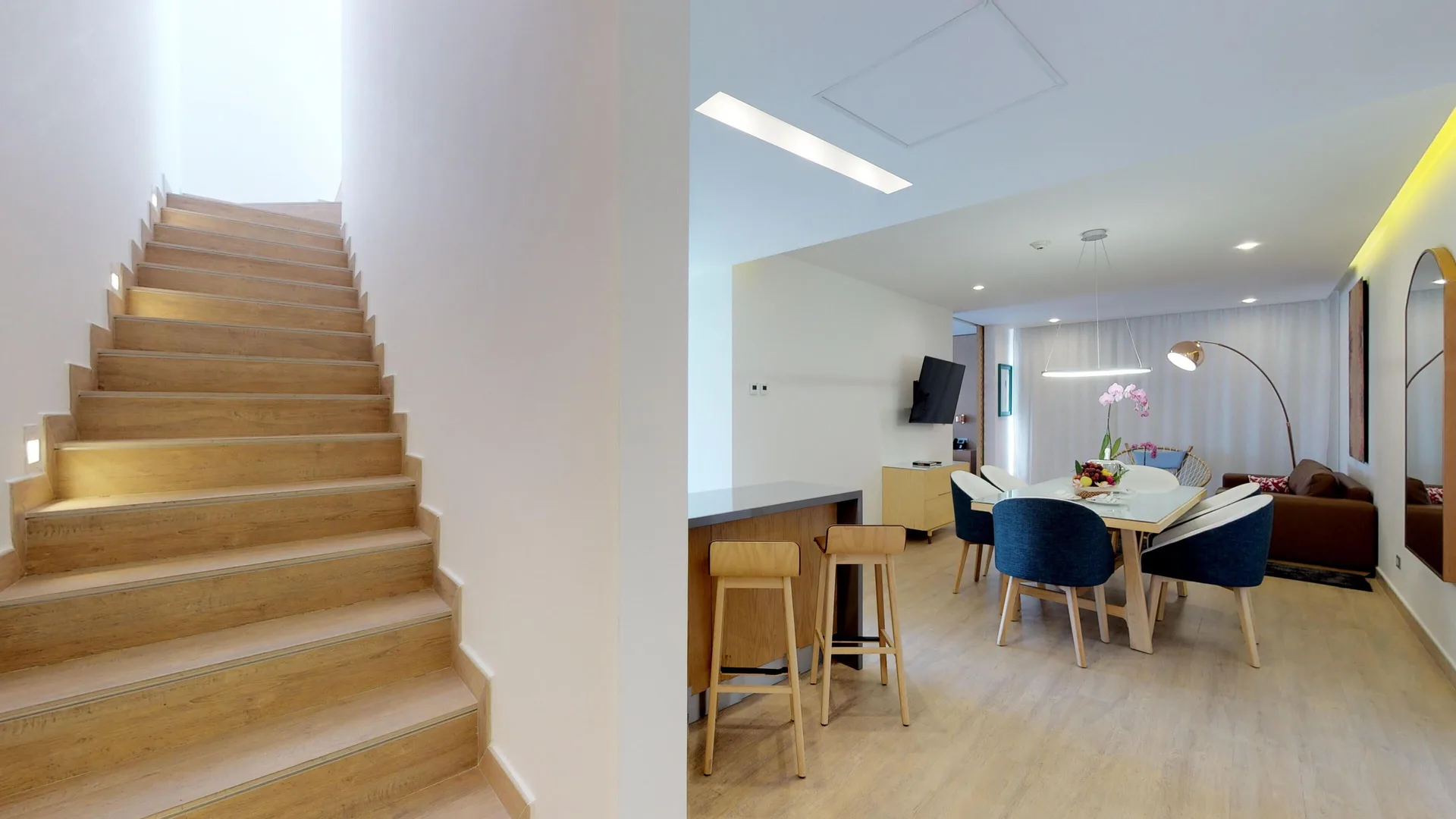 Three Bedroom Penthouse Suite dining area and stairs at The Fives Beach Hotel.