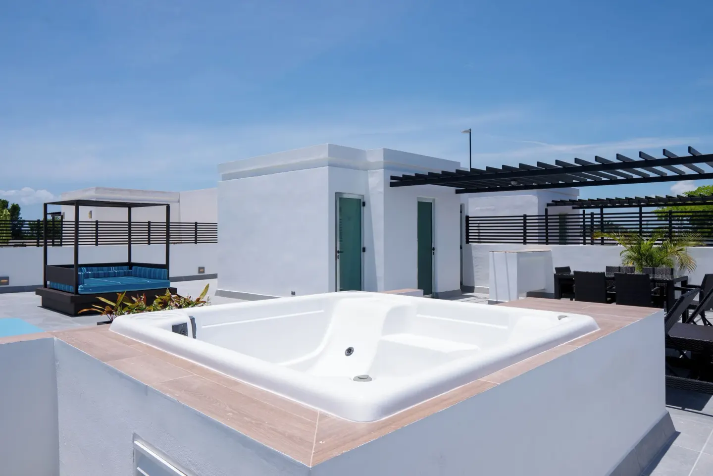 Three Bedroom Penthouse Suite rooftop hot tub at The Fives Beach Hotel.