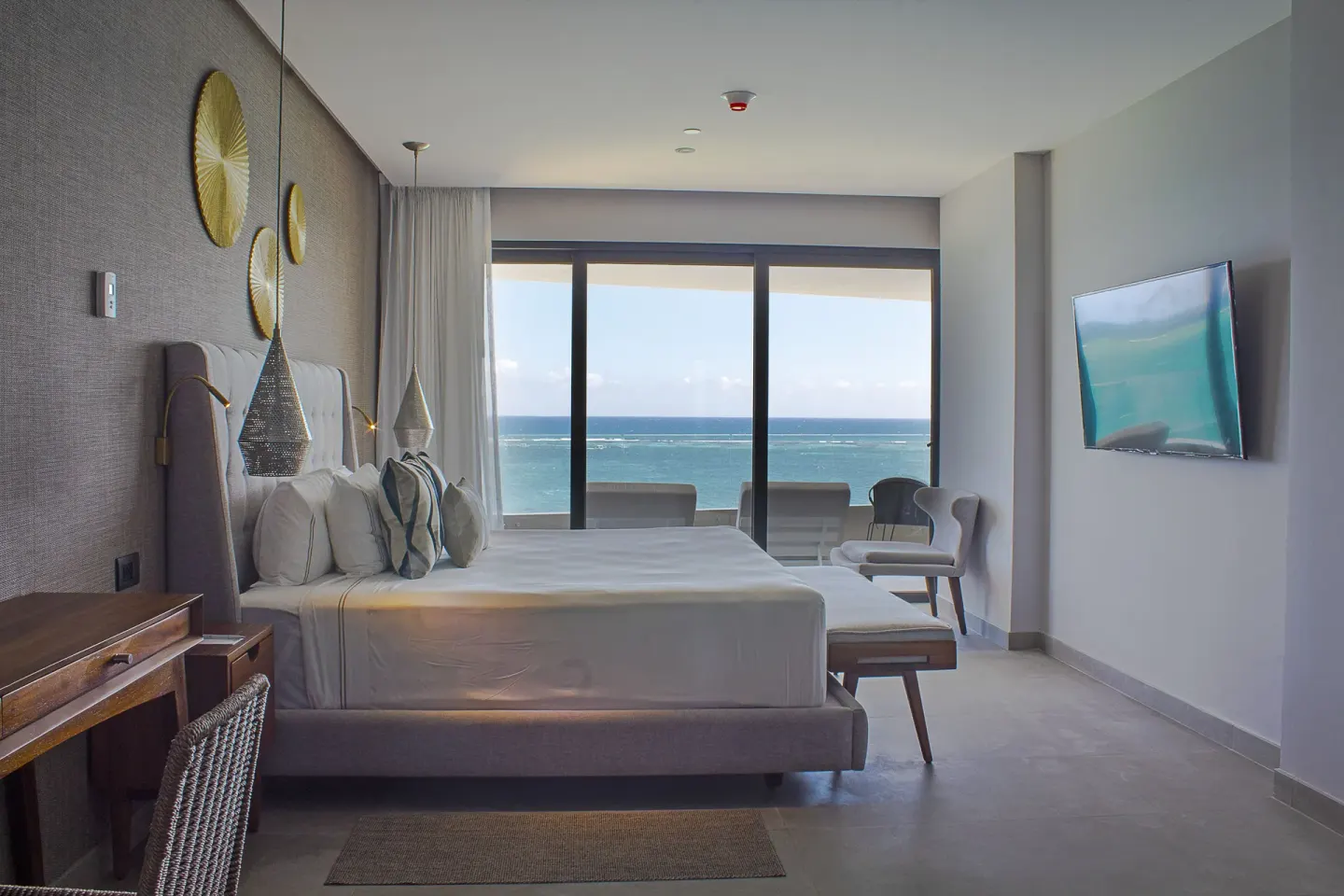 Oceanfront king bed guest room at The Fives Oceanfront Riviera Maya.