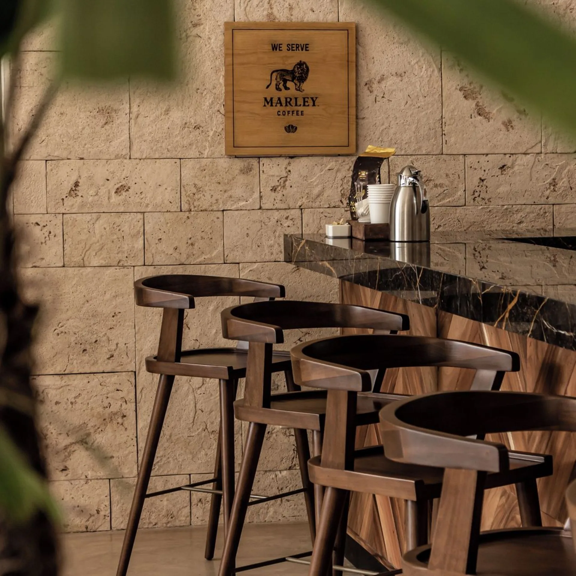 Coffee counter with bar stools at The Fives Oceanfront Riviera Maya.