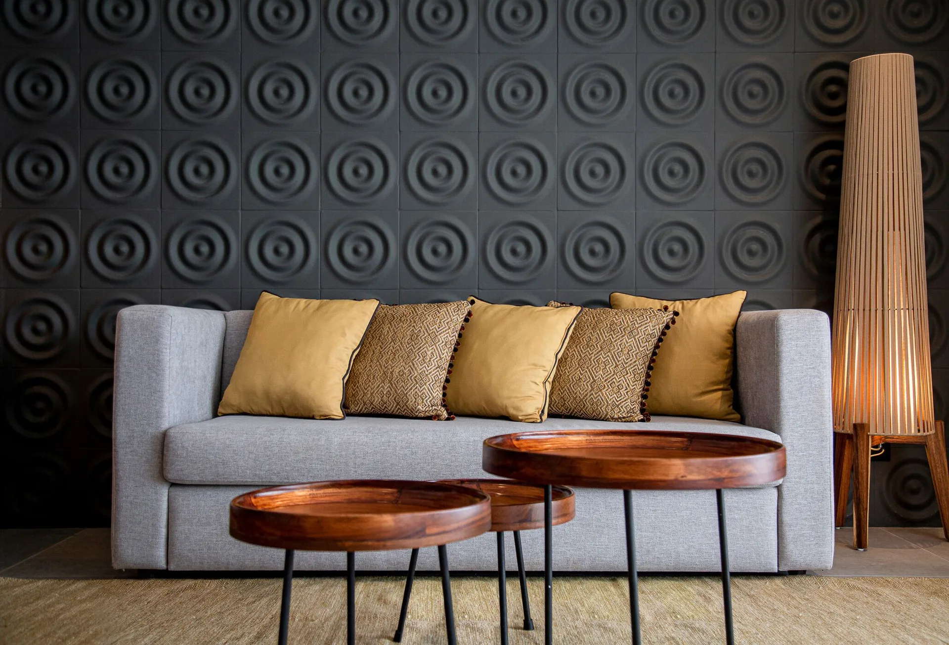 Sofa seating area in a 1 Bedroom Oceanview Residence at The Fives Oceanfront Riviera Maya.