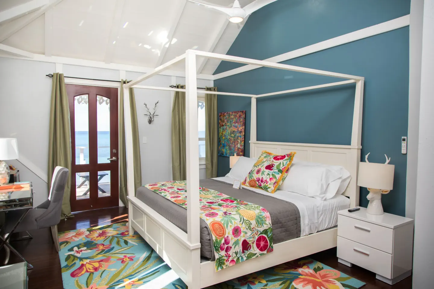 Premier Room Albert's Room at The Fred with four-poster bed, balcony doors, and sea view.