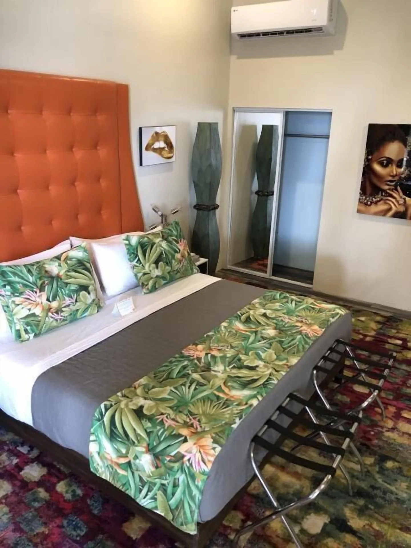 Standard Room, Balcony (the Michelle) bed with tropical accents at The Fred.