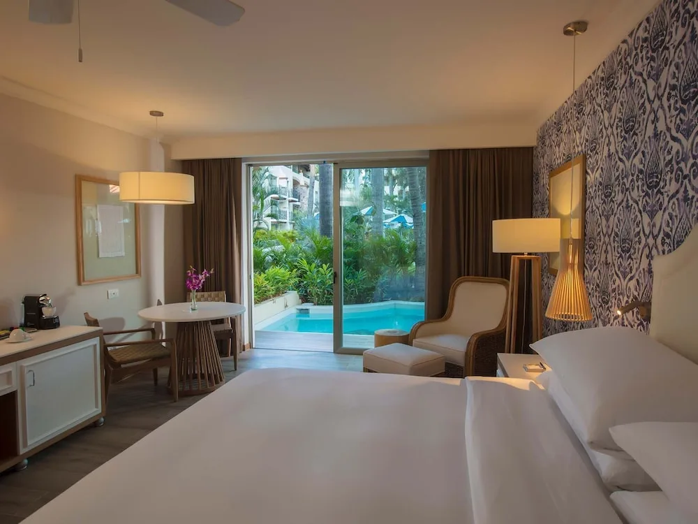 King guest room with plunge pool terrace at The Hacienda at Krystal Grand Puerto Vallarta.