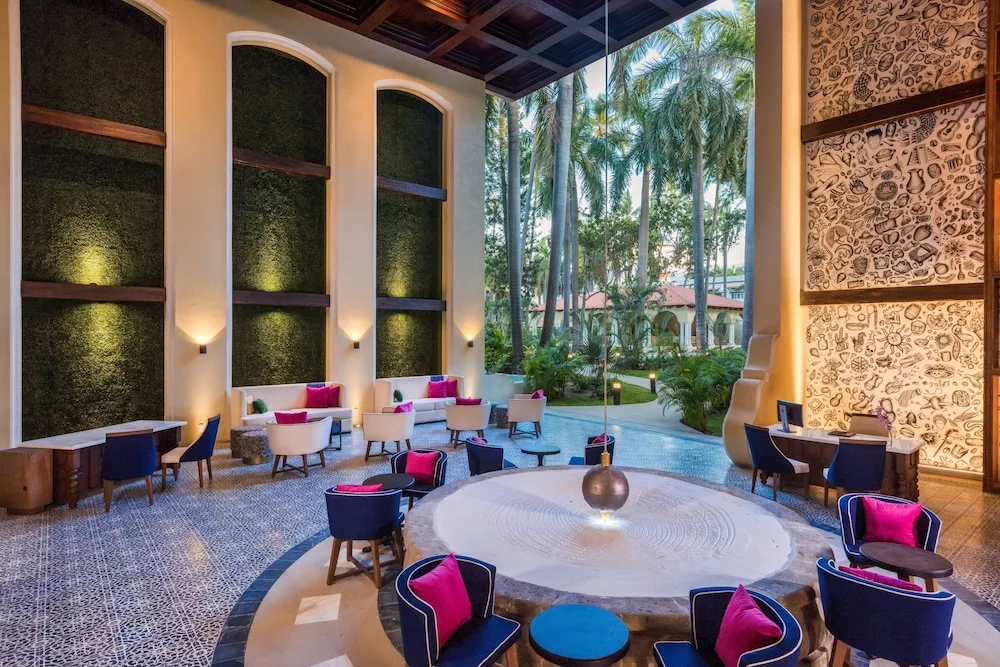 Lounge seating and central fountain at The Hacienda at Krystal Grand Puerto Vallarta.