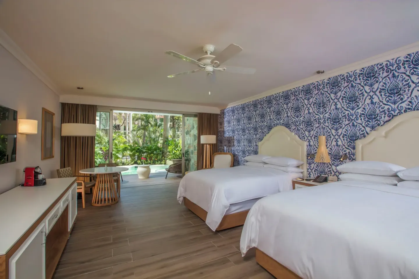 Junior Suite The Hacienda at Krystal Grand Puerto Vallarta with two beds and open terrace at The Hacienda at Krystal Grand Puerto Vallarta.