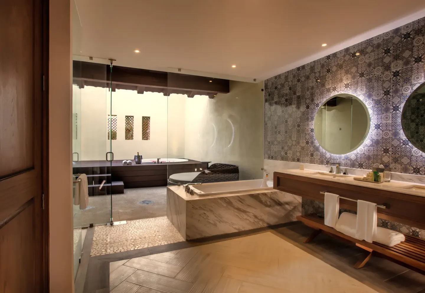 Junior Suite The Hacienda at Krystal Grand Puerto Vallarta bathroom with tub and vanity at The Hacienda at Krystal Grand Puerto Vallarta.