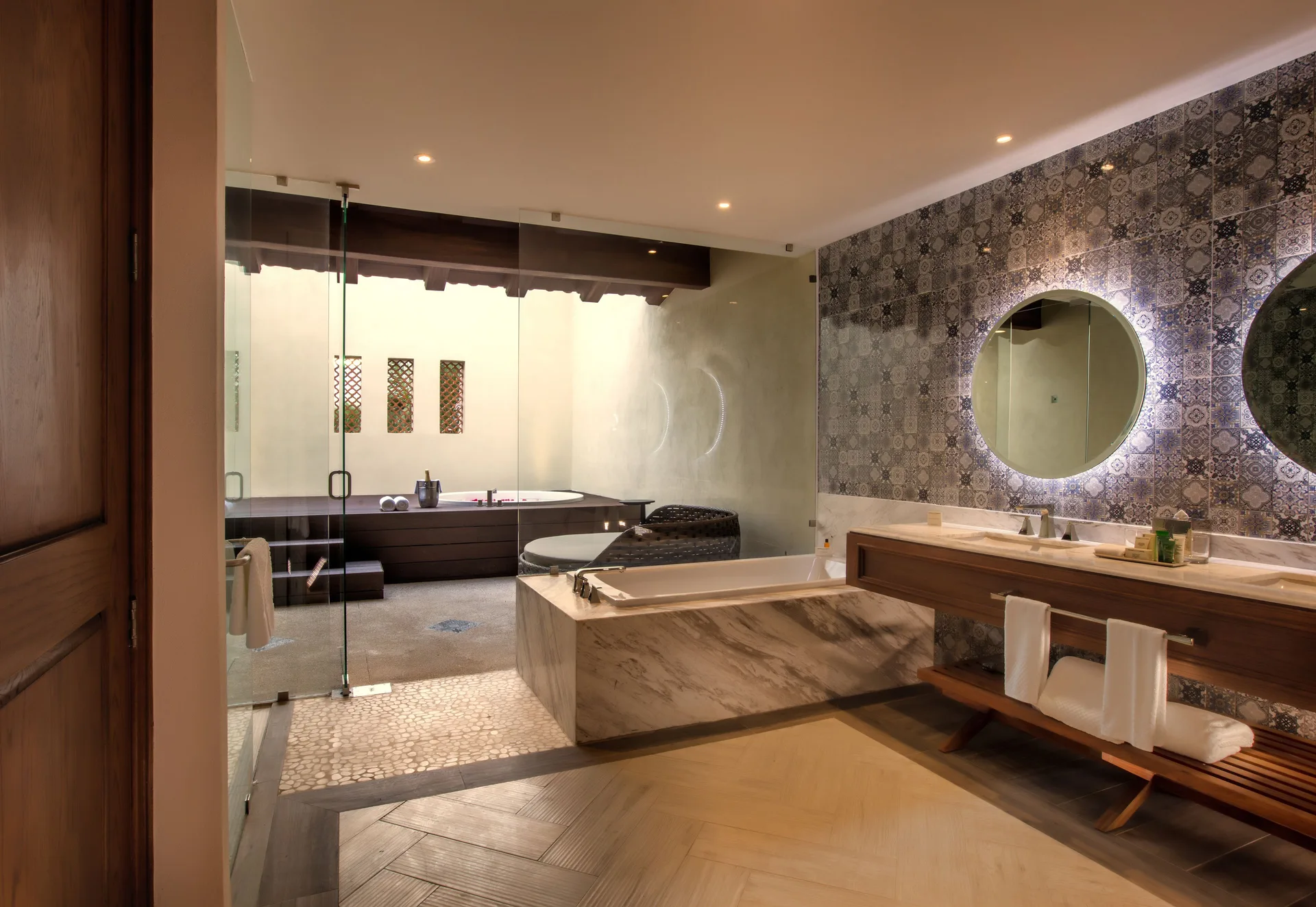 Junior Suite The Hacienda at Krystal Grand Puerto Vallarta bathroom with tub and vanity at The Hacienda at Krystal Grand Puerto Vallarta.