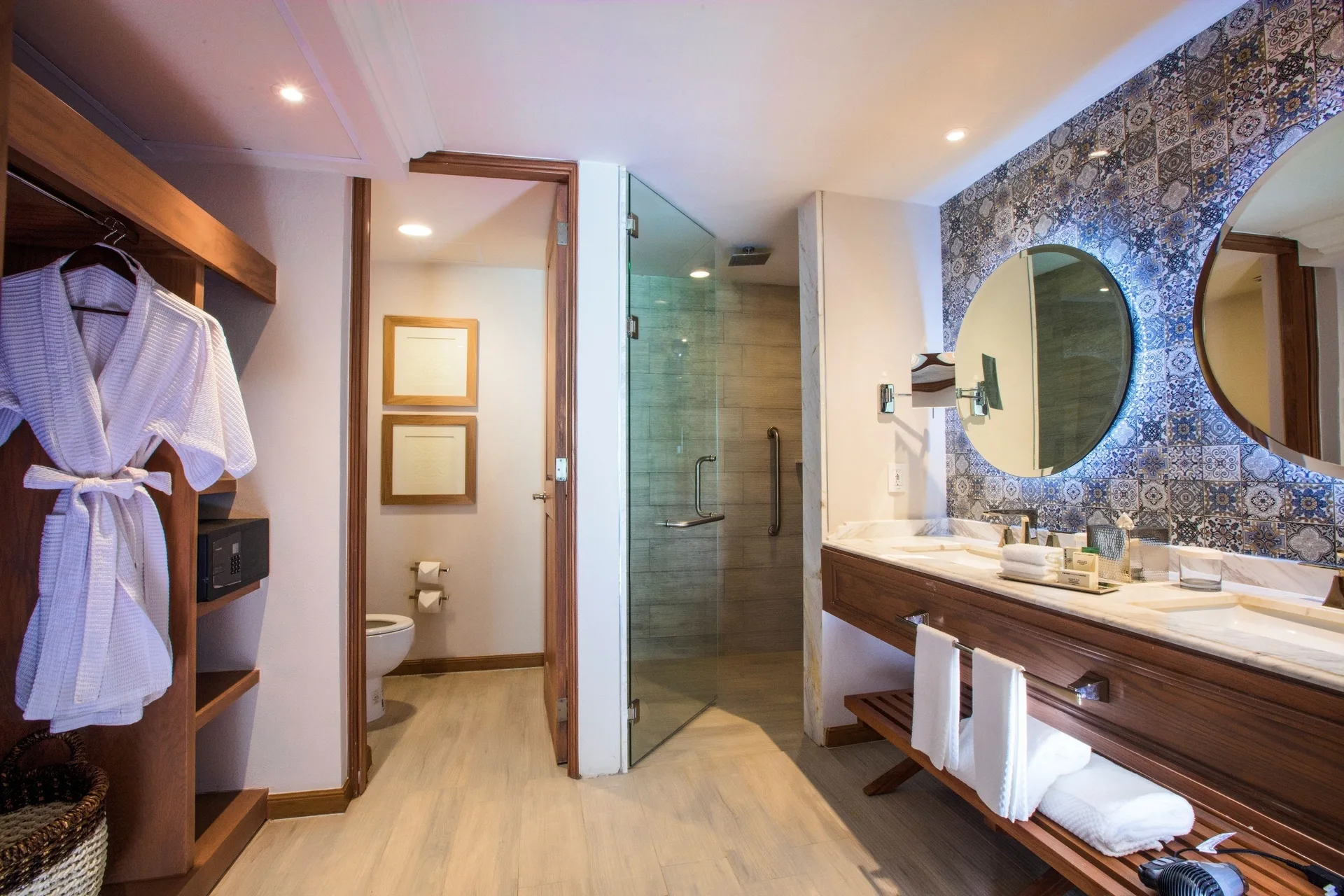Junior Suite Hacienda bathroom vanity and shower at The Hacienda at Krystal Grand Puerto Vallarta.