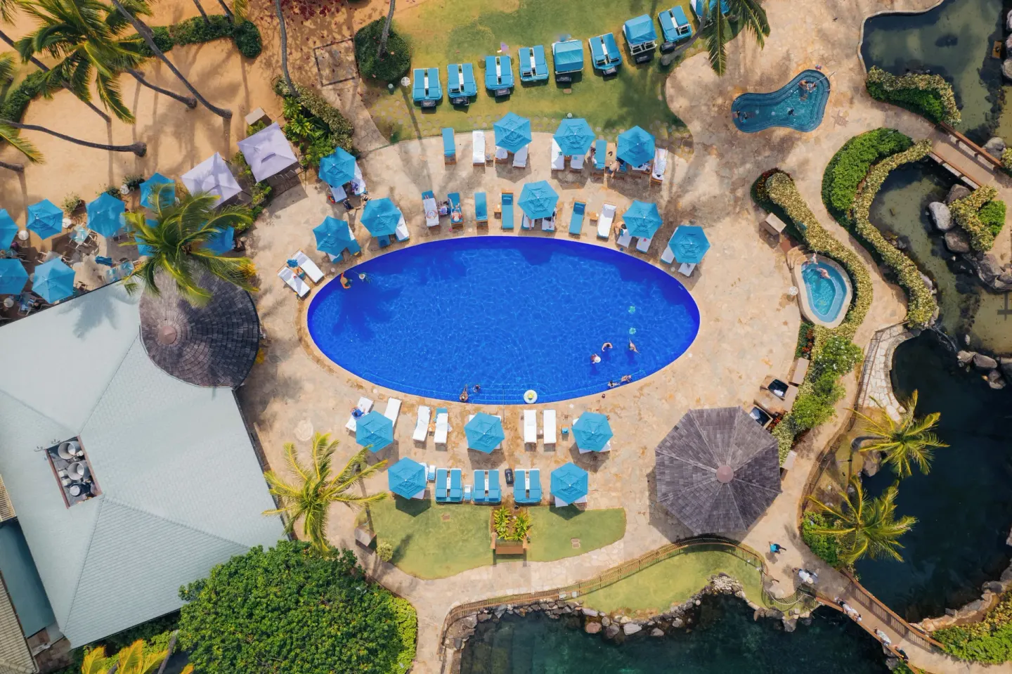 Aerial view of the pool deck and lagoon areas at The Kahala Hotel & Resort.