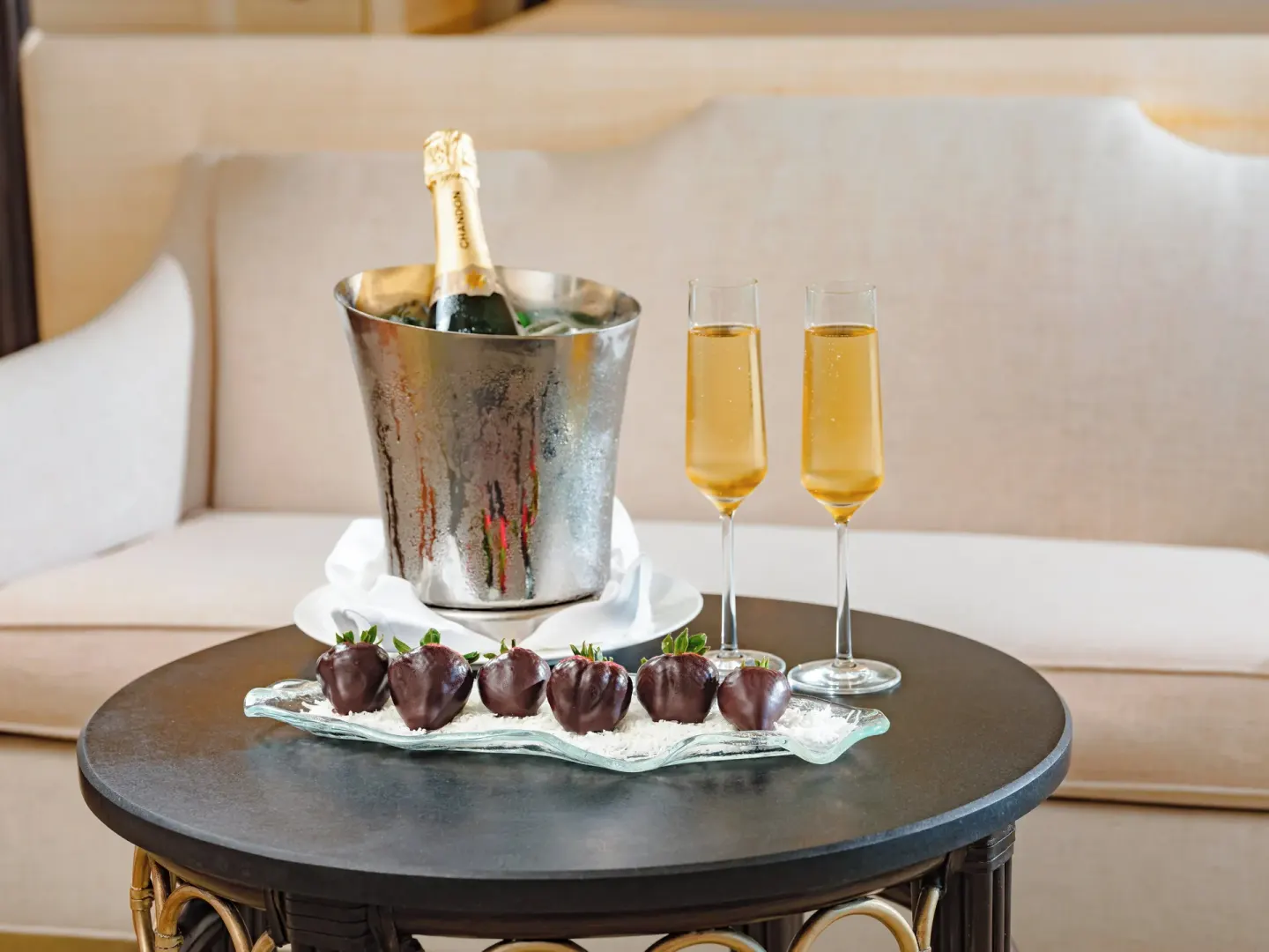 Champagne flutes and chocolate-dipped strawberries at The Kahala Hotel & Resort.