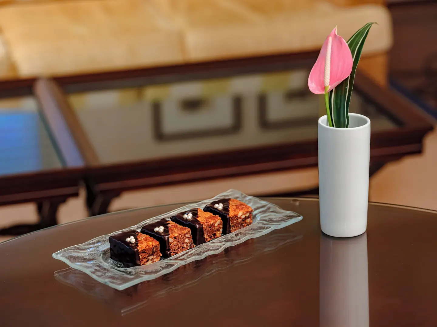 Chocolate dessert bites with a tropical flower at The Kahala Hotel & Resort.