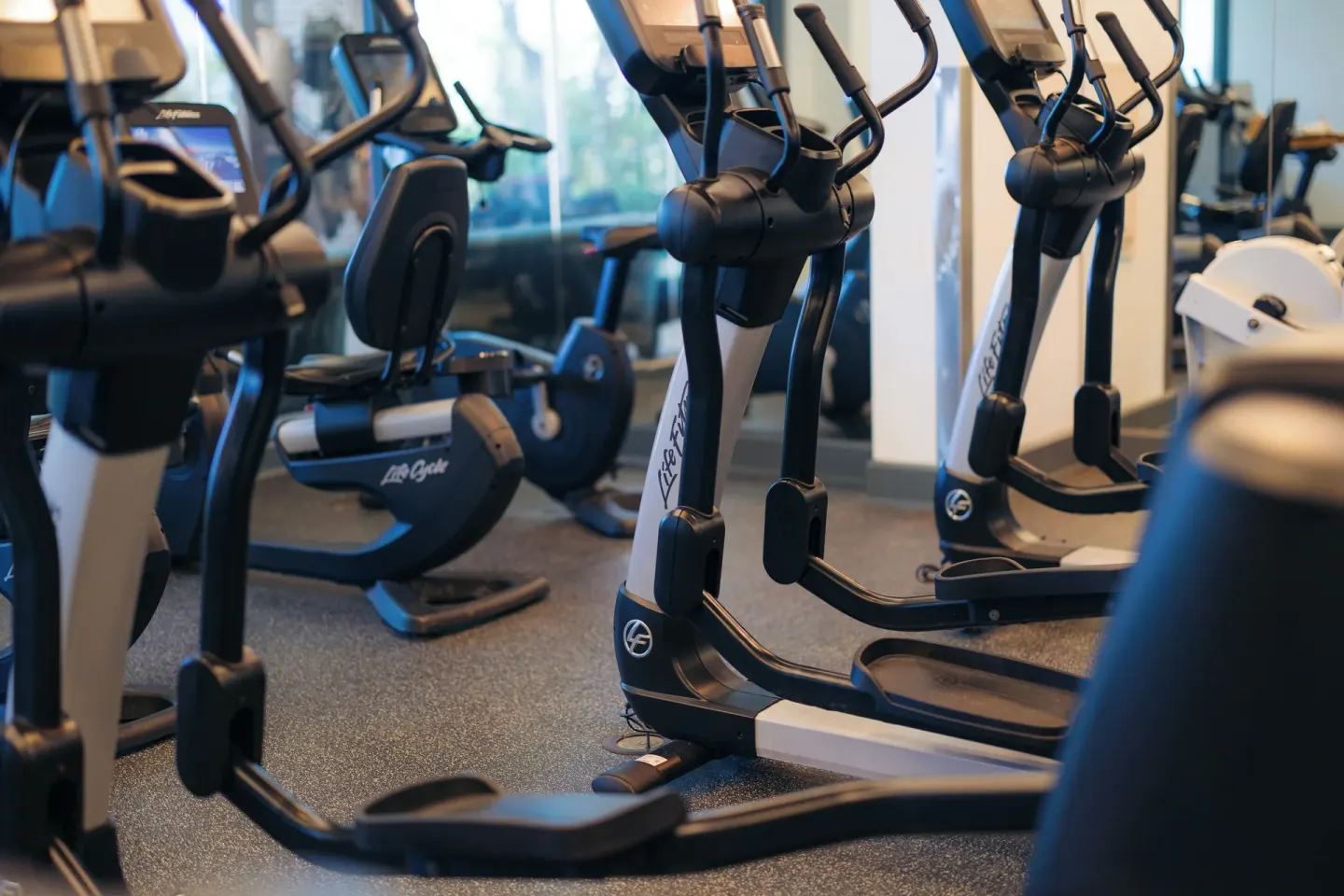 Close-up of elliptical machines in the fitness center at The Kahala Hotel & Resort.
