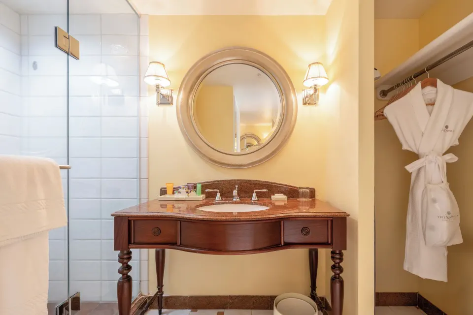 Golf Mountain View bathroom vanity and shower at The Kahala Hotel & Resort.