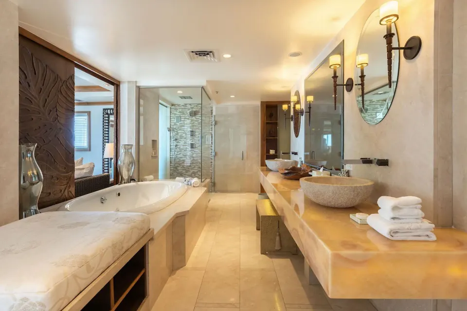 Imperial Suite bathroom with soaking tub and double vanity at The Kahala Hotel & Resort.