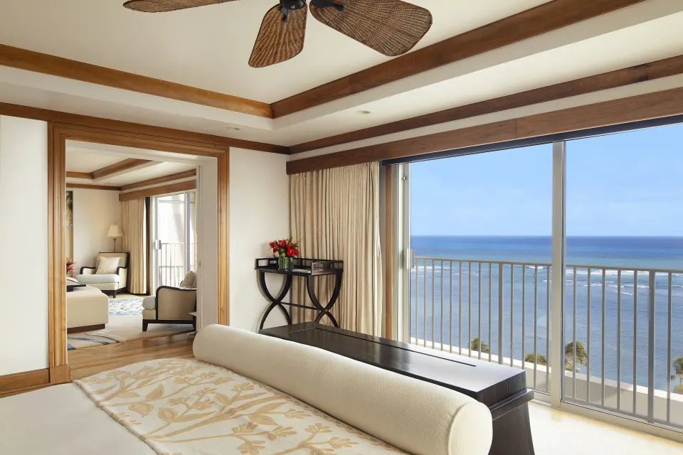 Imperial Suite bedroom with ocean-facing balcony doors at The Kahala Hotel & Resort.