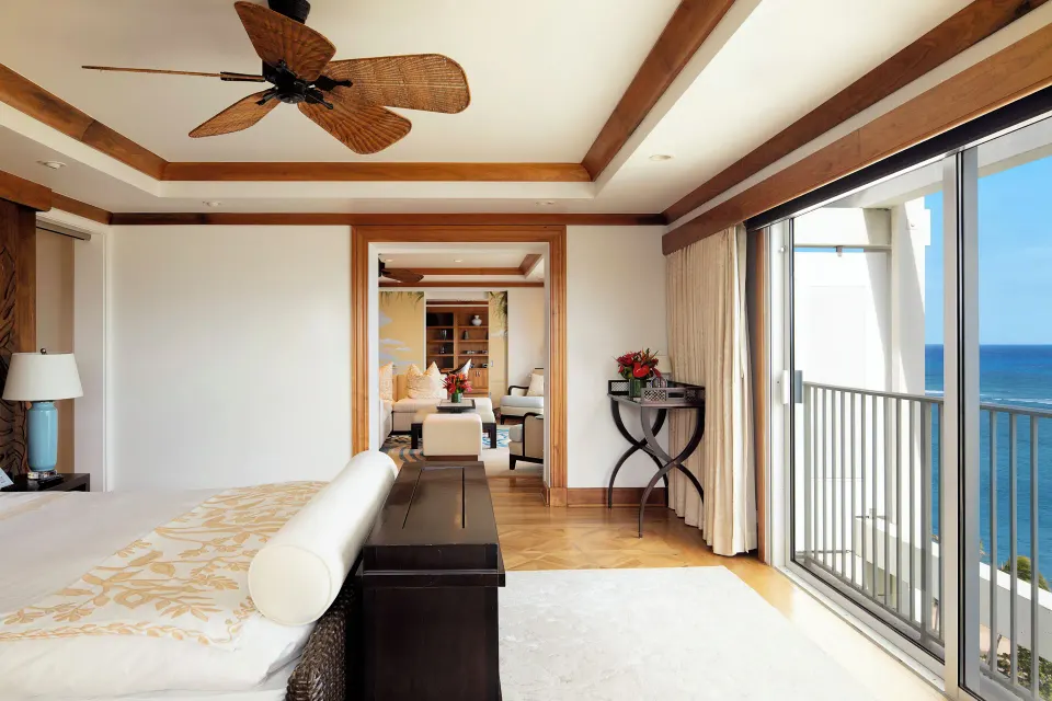Imperial Suite bedroom with king bed and balcony ocean view at The Kahala Hotel & Resort.