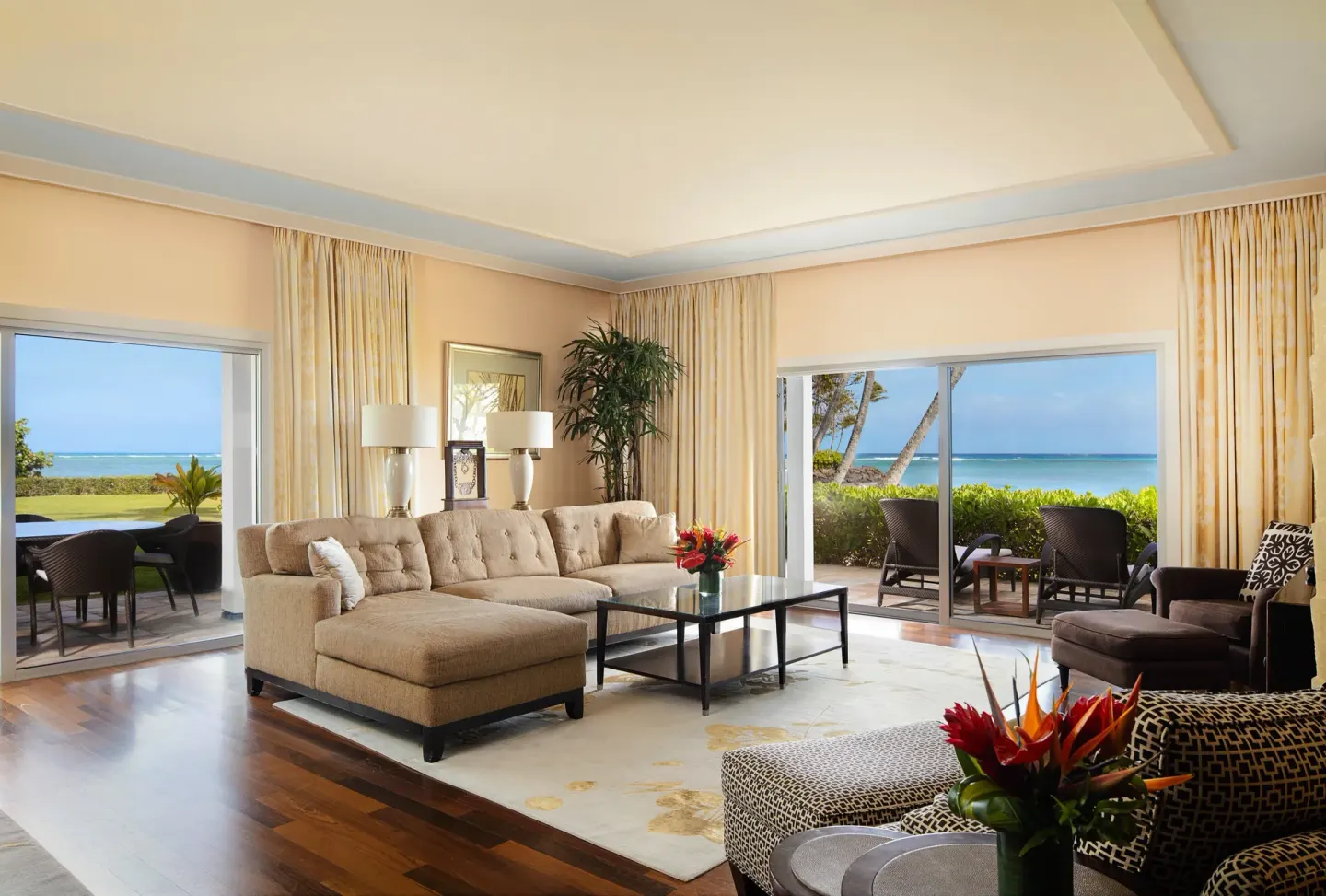 The Kahala Hotel & Resort living room with ocean-facing lanais at The Kahala Hotel & Resort.