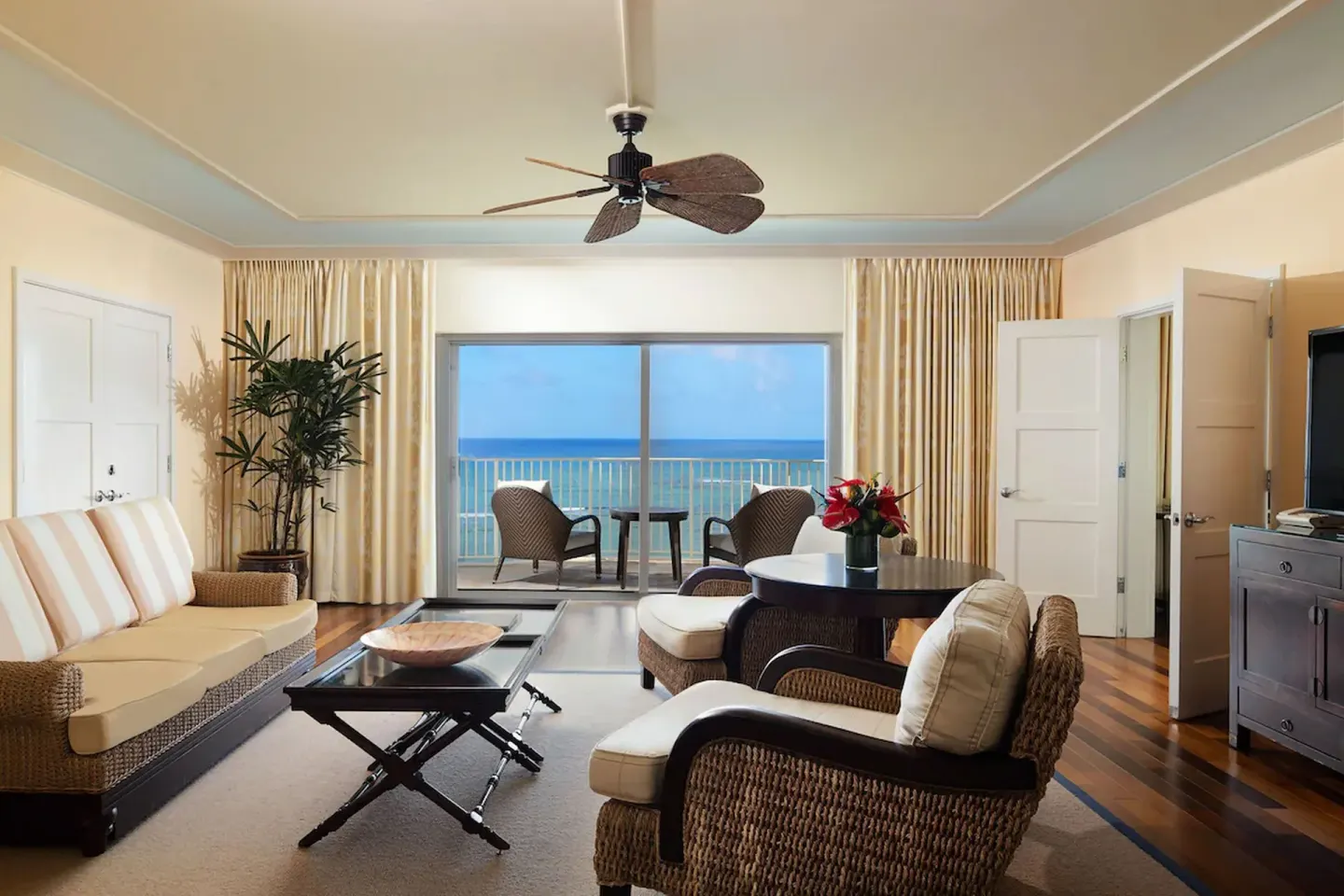 Ocean Front Suite living room with balcony ocean view at The Kahala Hotel & Resort.