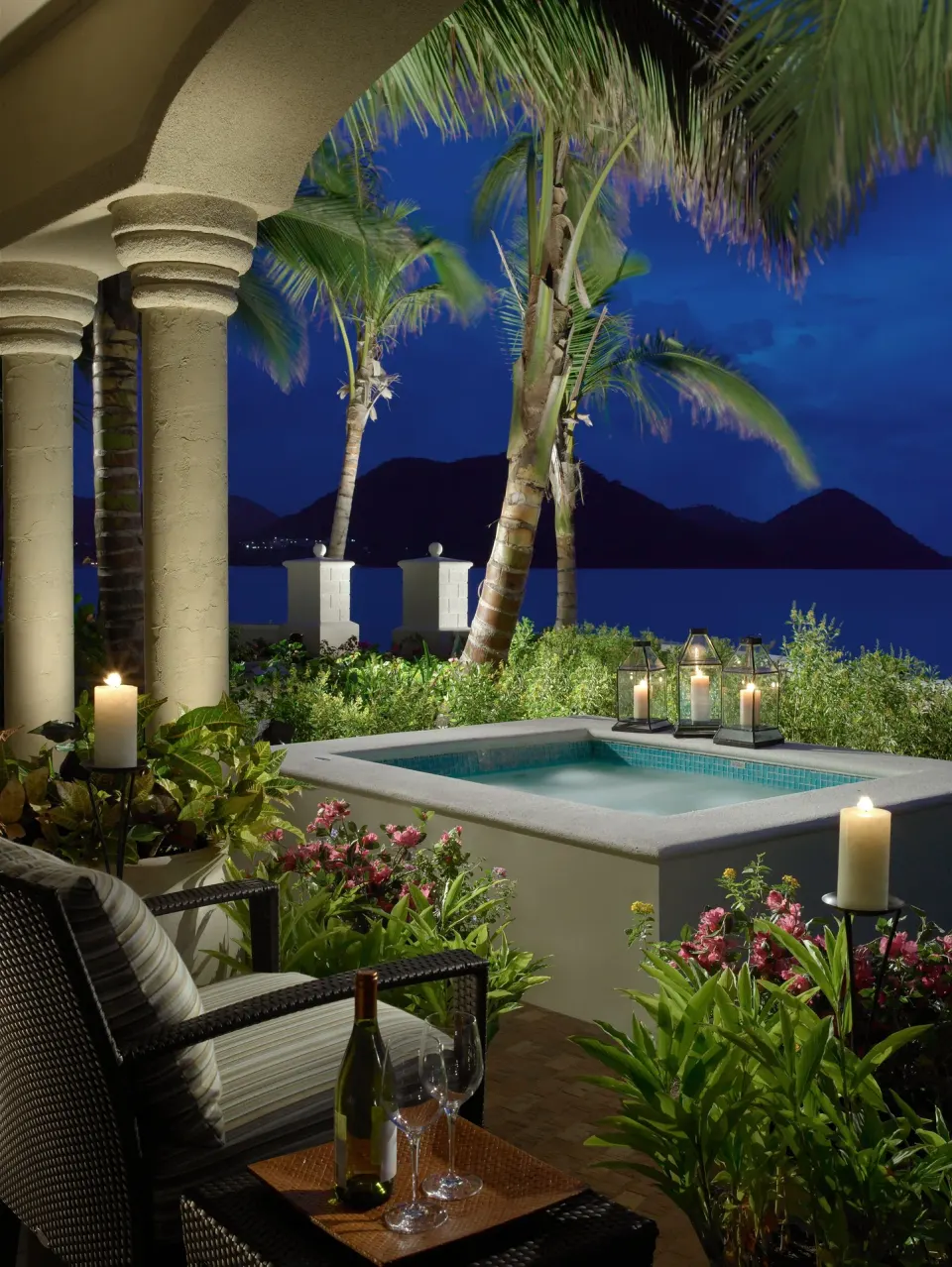 Candlelit terrace with plunge pool and sea view at The Landings Resort & Spa.
