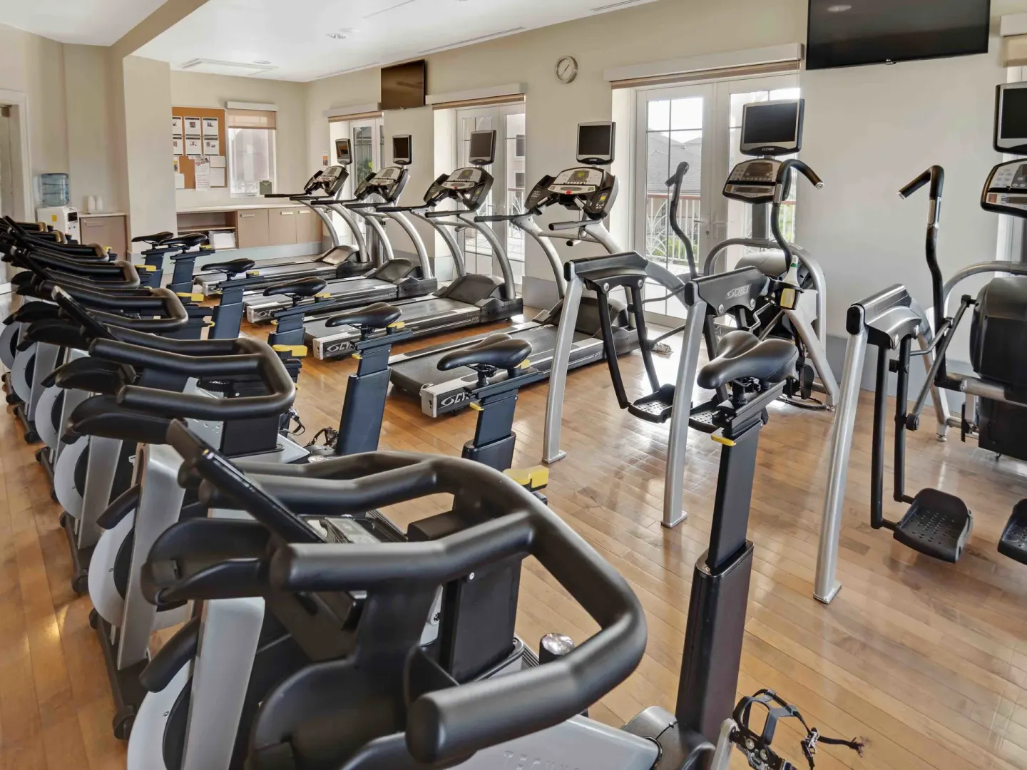 Fitness center with treadmills, bikes, and cardio machines at The Landings Resort & Spa.