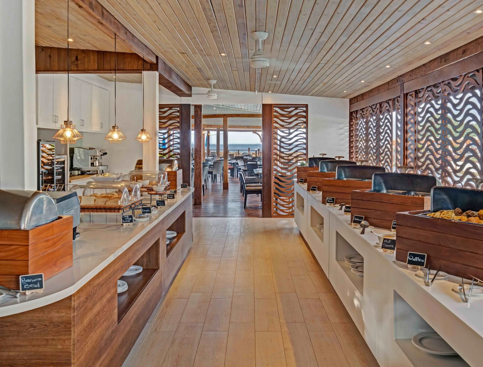 Breakfast buffet with pastries and hot dishes at The Landings Resort & Spa.