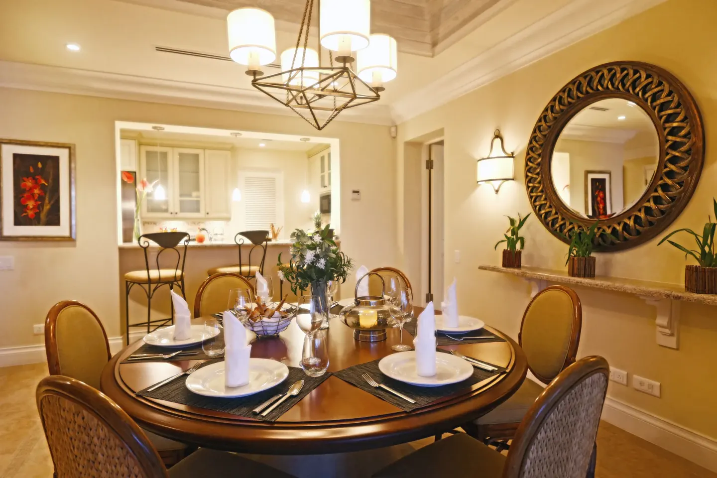Dining area set for four in a villa suite at The Landings Resort & Spa.