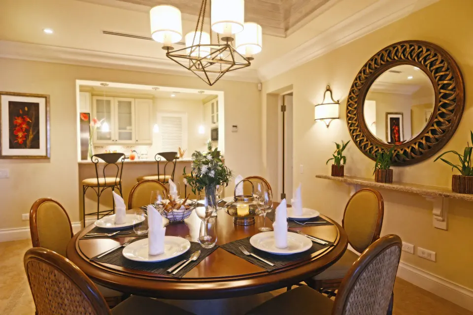 Dining area set for four in a villa suite at The Landings Resort & Spa.