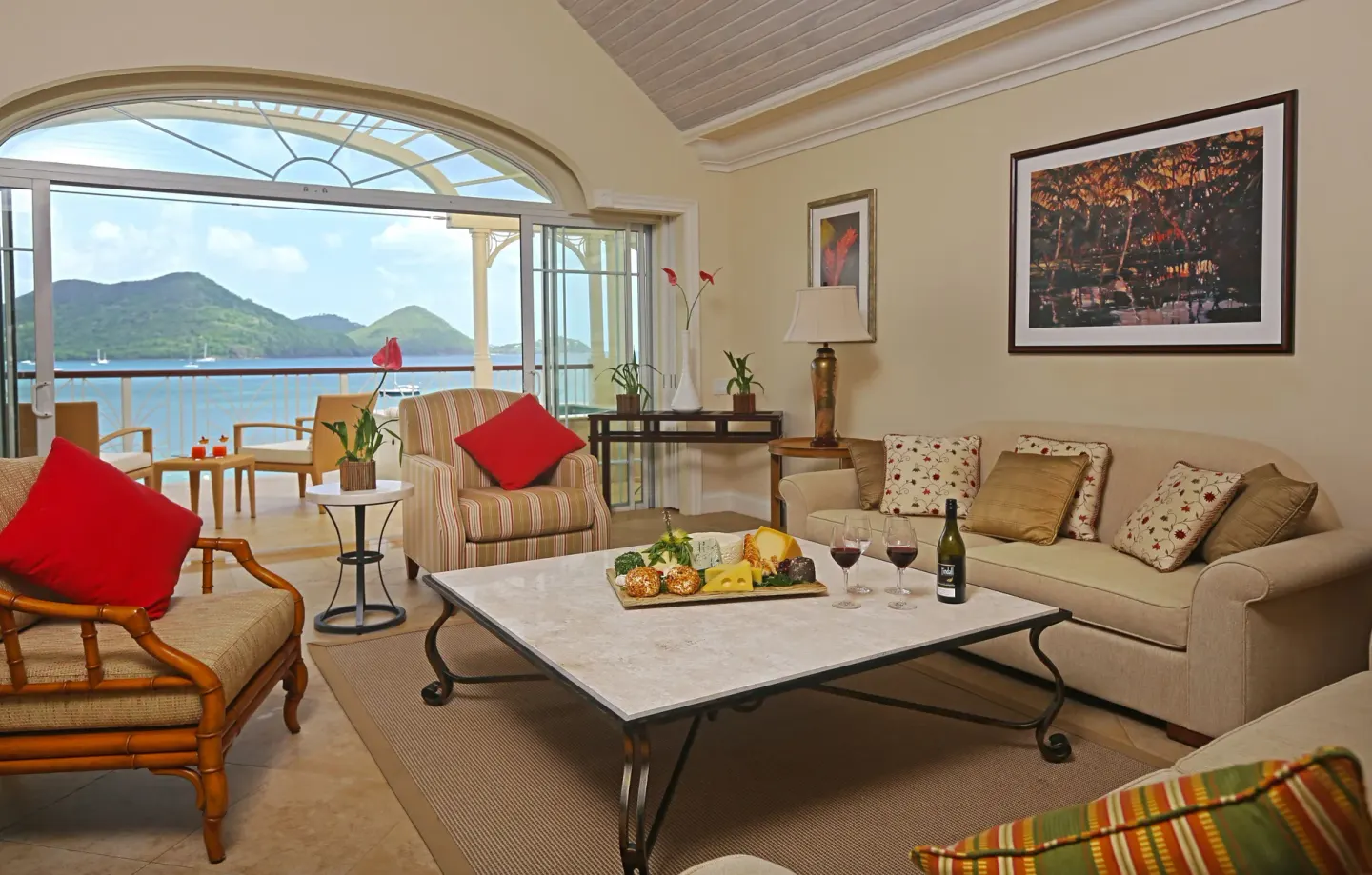 Beachfront villa lounge with balcony and sea view at The Landings Resort & Spa.