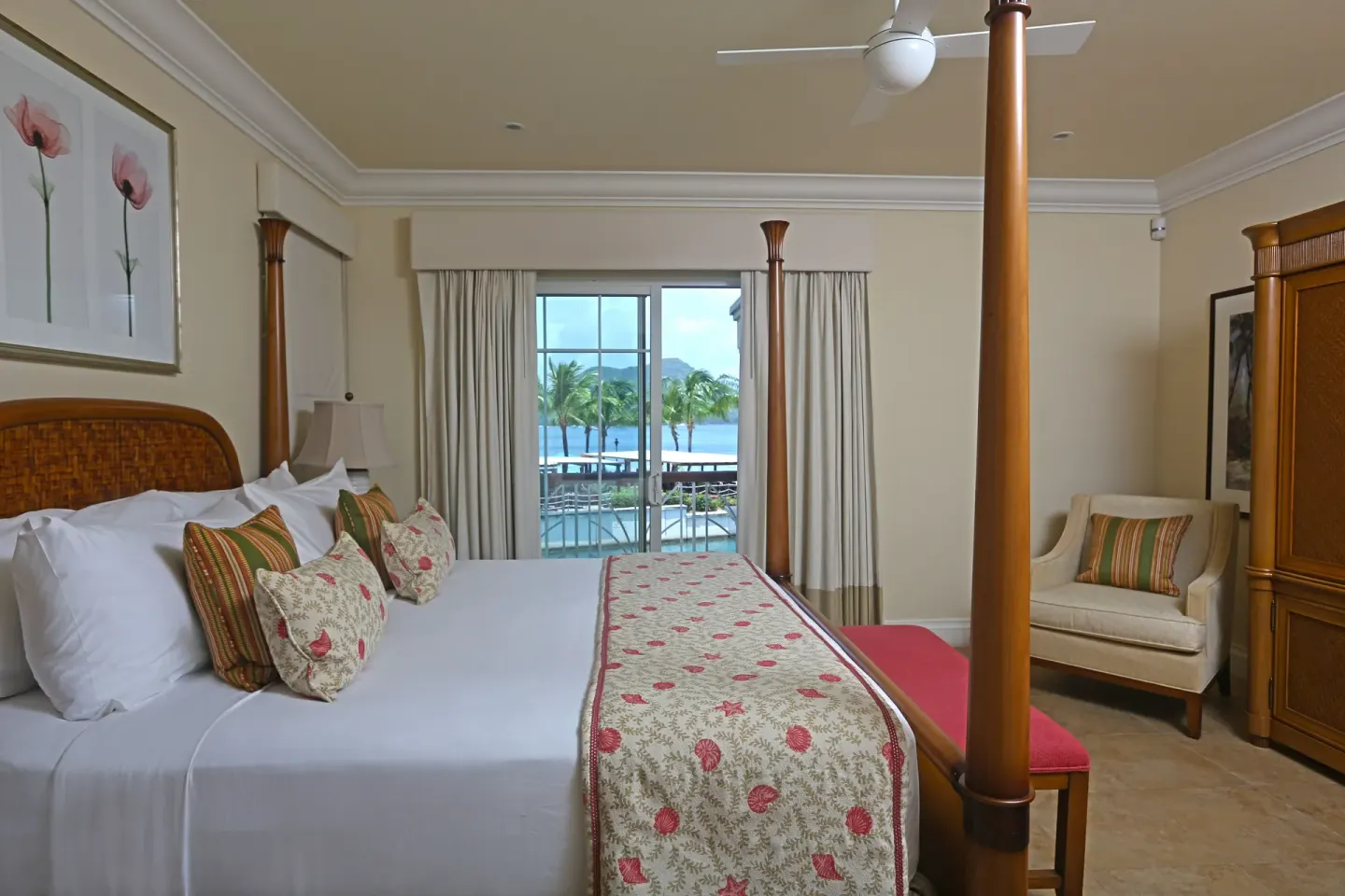 Four-poster king bedroom with marina view in a 3 Bedroom Villa Suite at The Landings Resort & Spa.