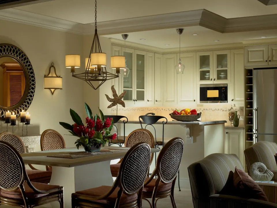 Dining area and kitchen in a 3 Bedroom Villa Suite Marina View at The Landings Resort & Spa.