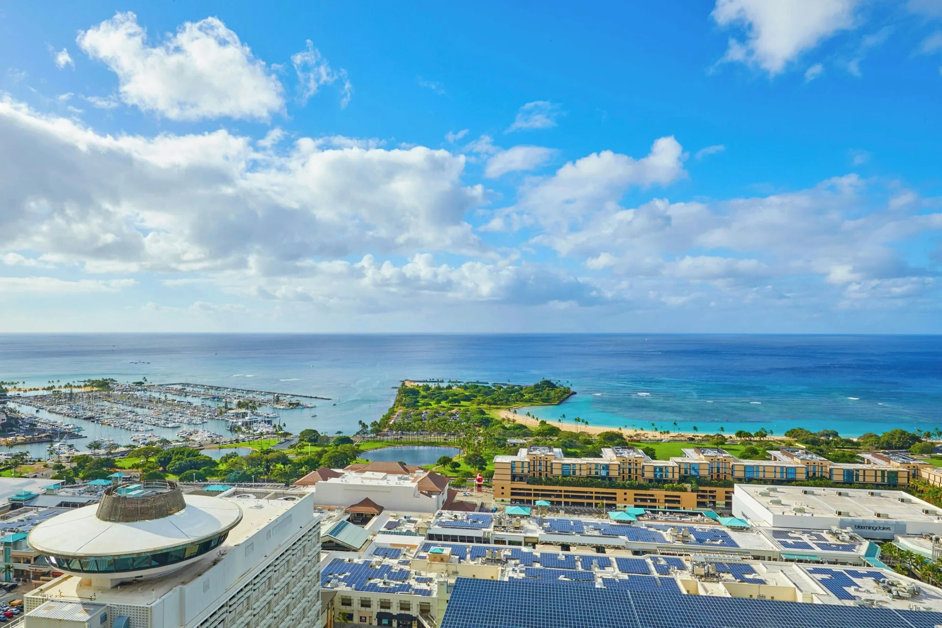 Renaissance Honolulu Hotel and Spa modern high-rise with spa, pool deck and city views