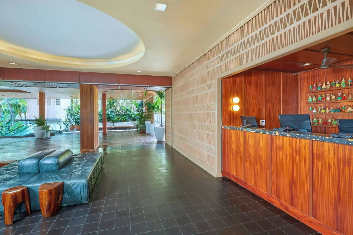 Reception counter and lobby lounge at The Laylow Waikiki, Autograph Collection.