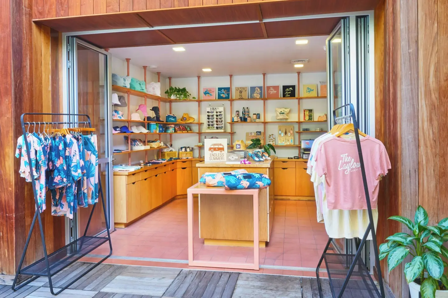 Open-front resort shop with clothing racks at The Laylow Waikiki, Autograph Collection.