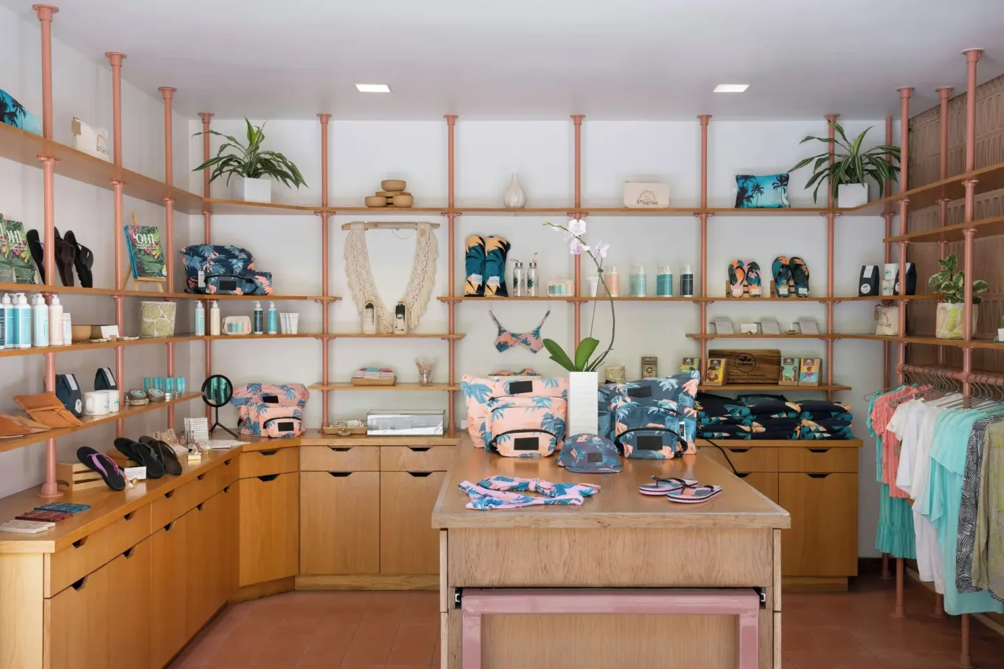 Resort shop shelves with apparel and accessories at The Laylow Waikiki, Autograph Collection.