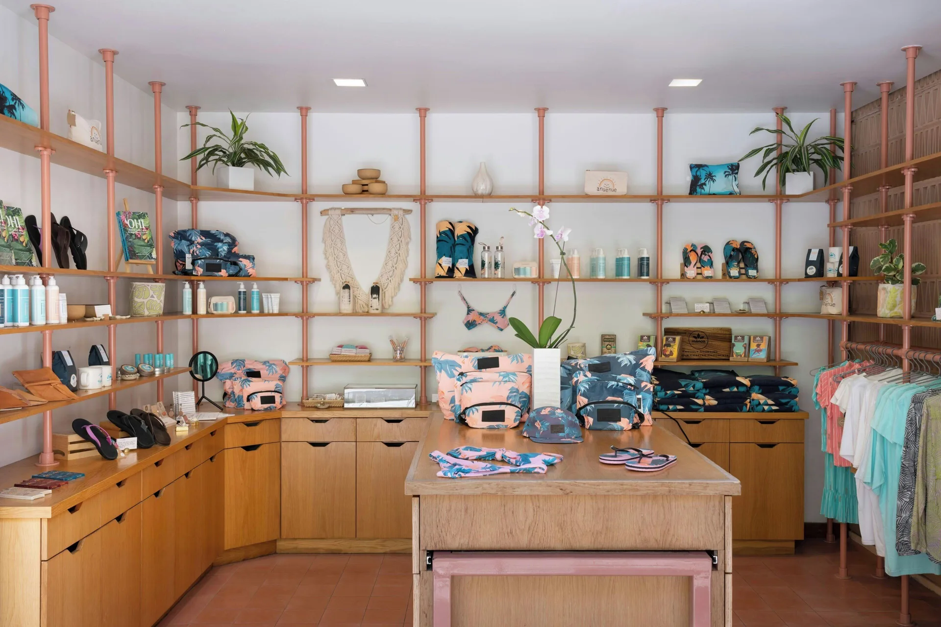 Resort shop shelves with apparel and accessories at The Laylow Waikiki, Autograph Collection.