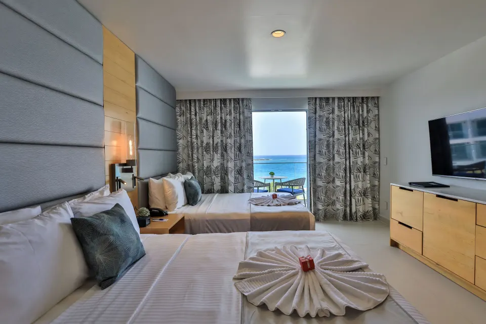 Oceanview Guestroom two beds with ocean view at The Morgan Resort Spa Village.