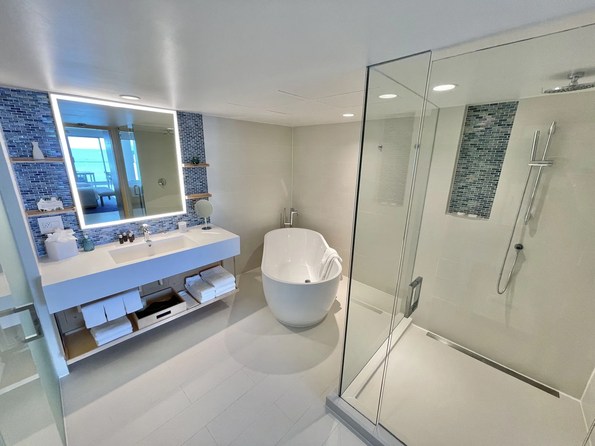Penthouse Oceanfront Suite bathroom with tub and shower at The Morgan Resort Spa Village.
