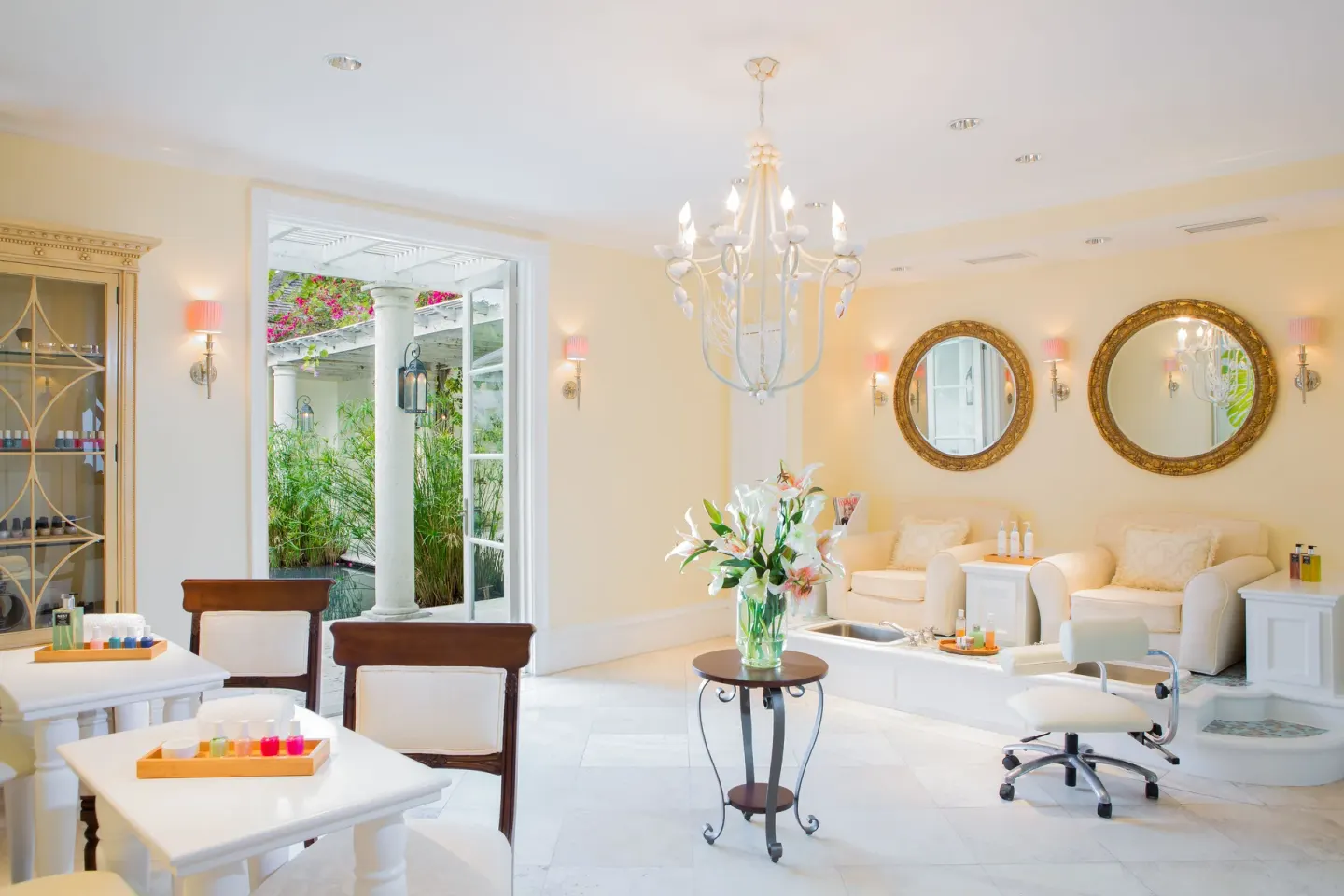 Spa lounge with manicure tables and pedicure chairs at The Palms Turks and Caicos.
