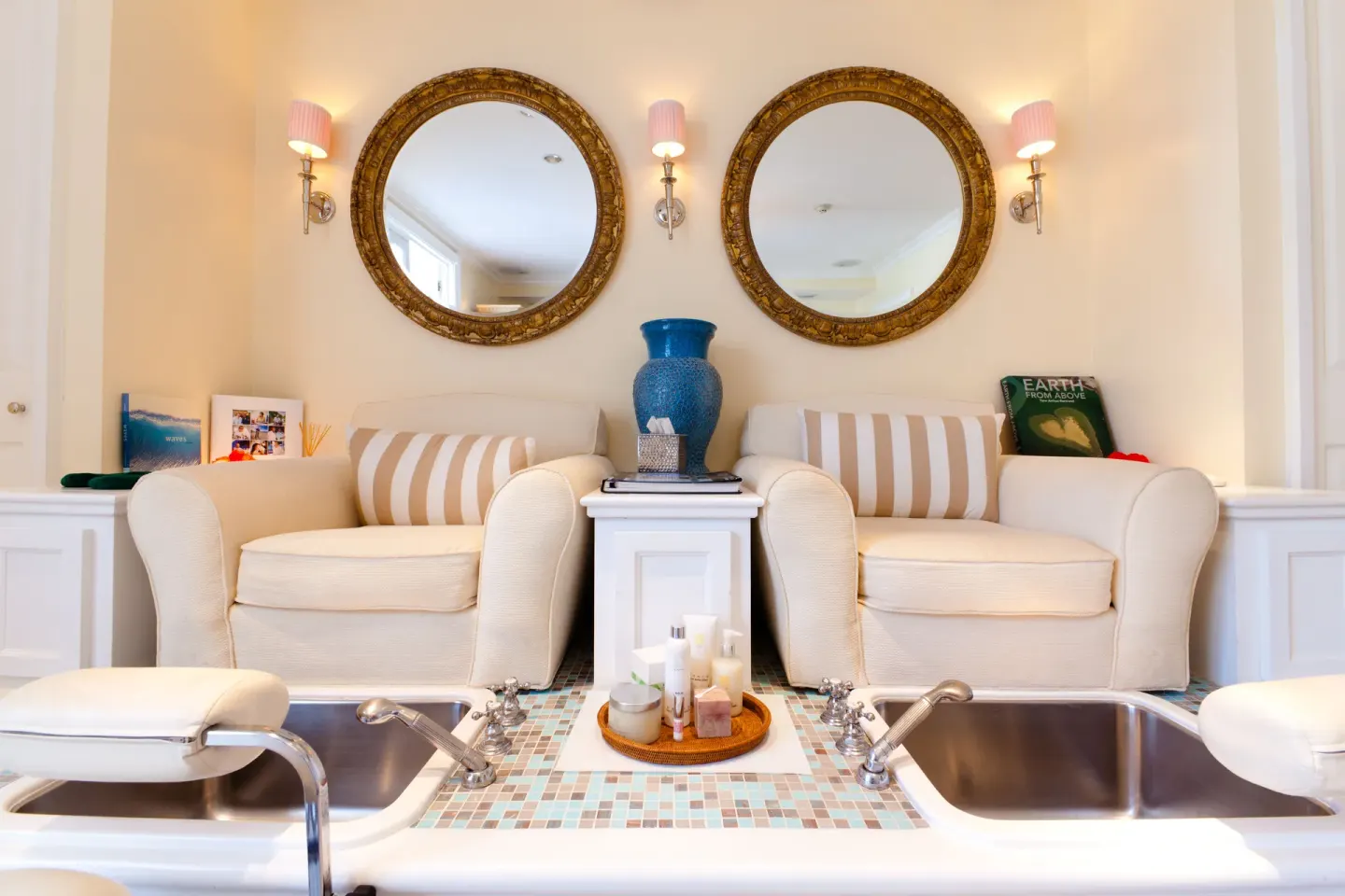 Pedicure chairs with foot basins in the spa at The Palms Turks and Caicos.