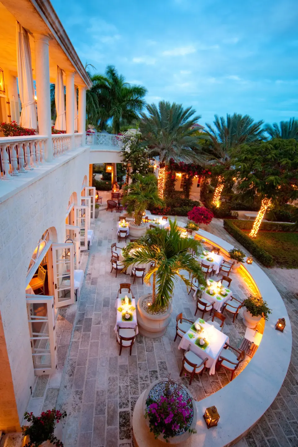 Elevated view of an open-air dining courtyard at The Palms Turks and Caicos.