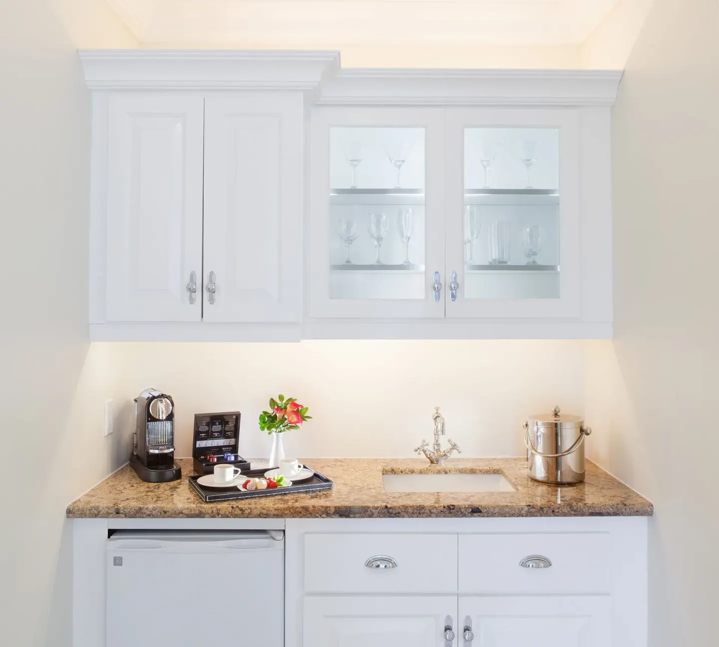 Junior Suite kitchenette cabinets and refreshment counter at The Palms Turks and Caicos.