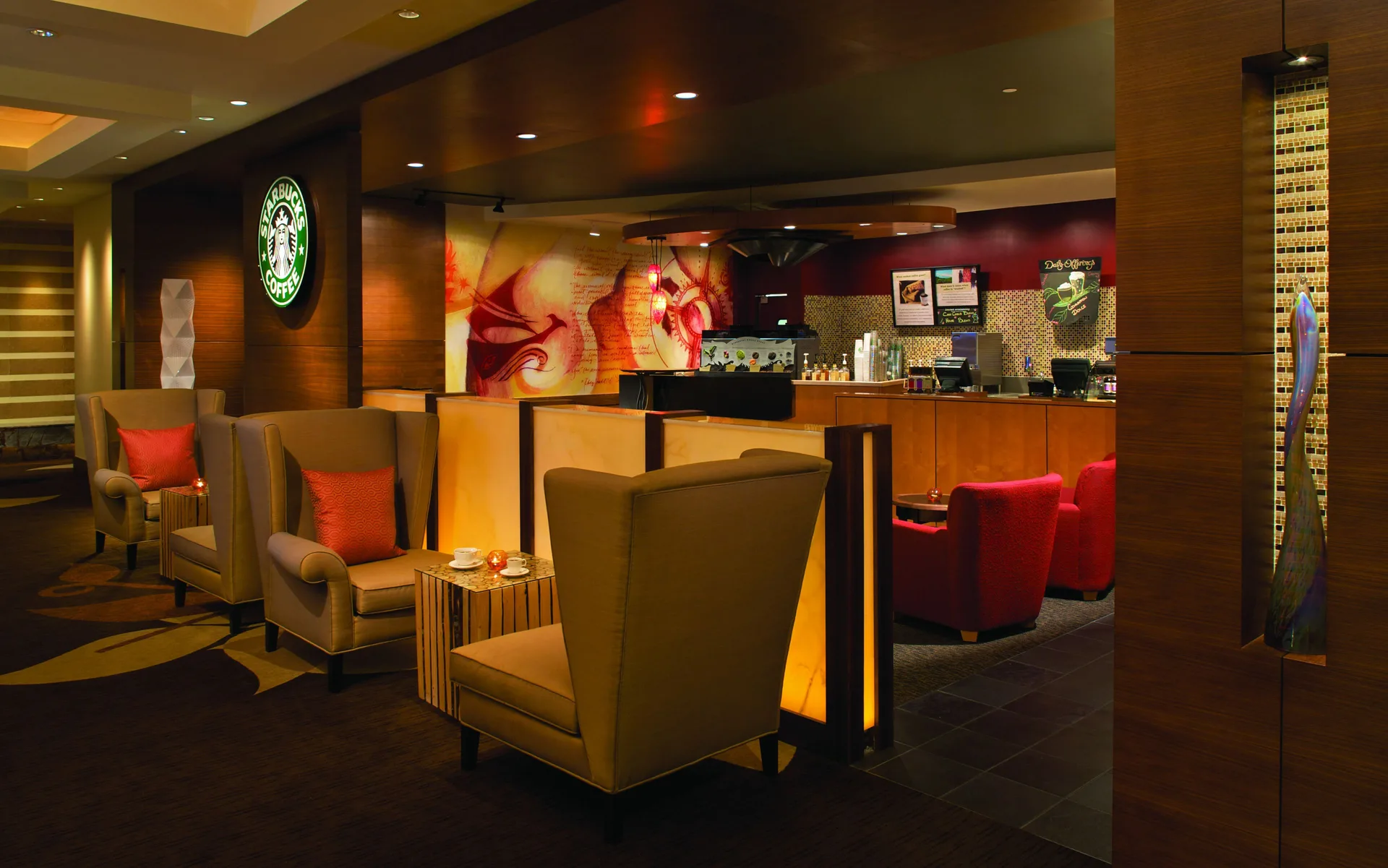 Starbucks lounge seating and counter inside The Reef at Atlantis.