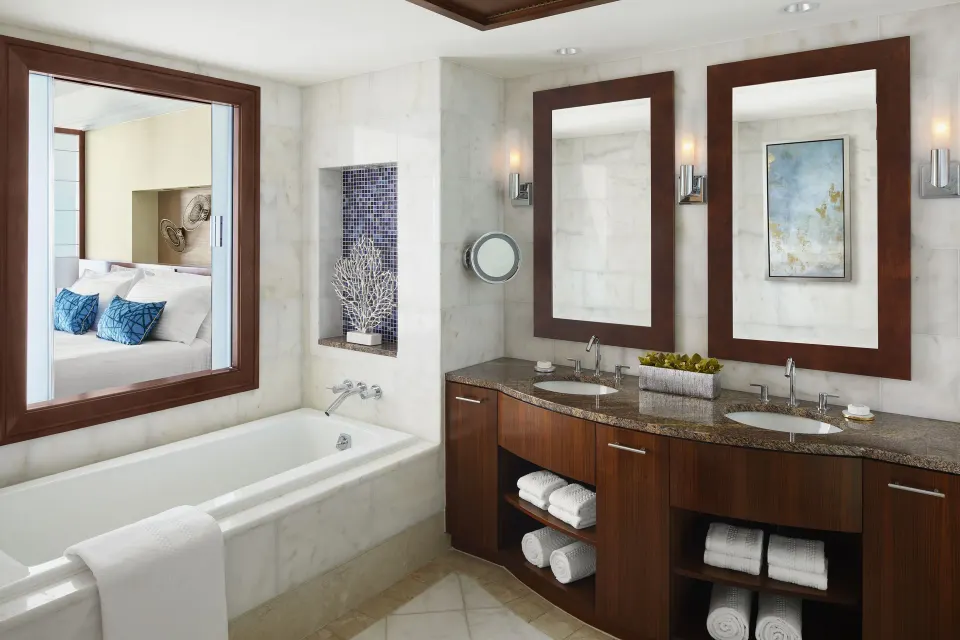 Studio Terrace View bathroom with tub and double vanity at The Reef at Atlantis.