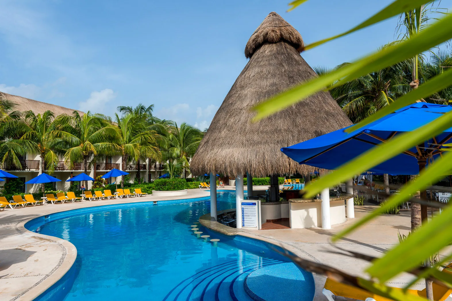 Inside the Premium Partial Ocean View Room at The Reef Coco Beach Resort & Spa — from the hotel's own gallery.